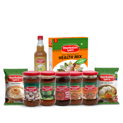 A collection of packaged food products including jars of pickle, rice mix, and  with a box of health mix
